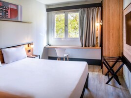 Quarto standard, 1 cama de casal | Frigobar, escrivaninha, cortinas blackout, quartos à prova de som