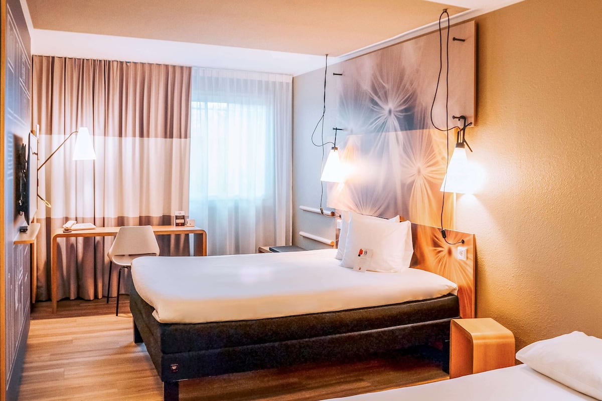 pillow-top beds, desk, blackout curtains, soundproofing