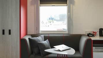 Hypo-allergenic bedding, desk, blackout drapes, soundproofing