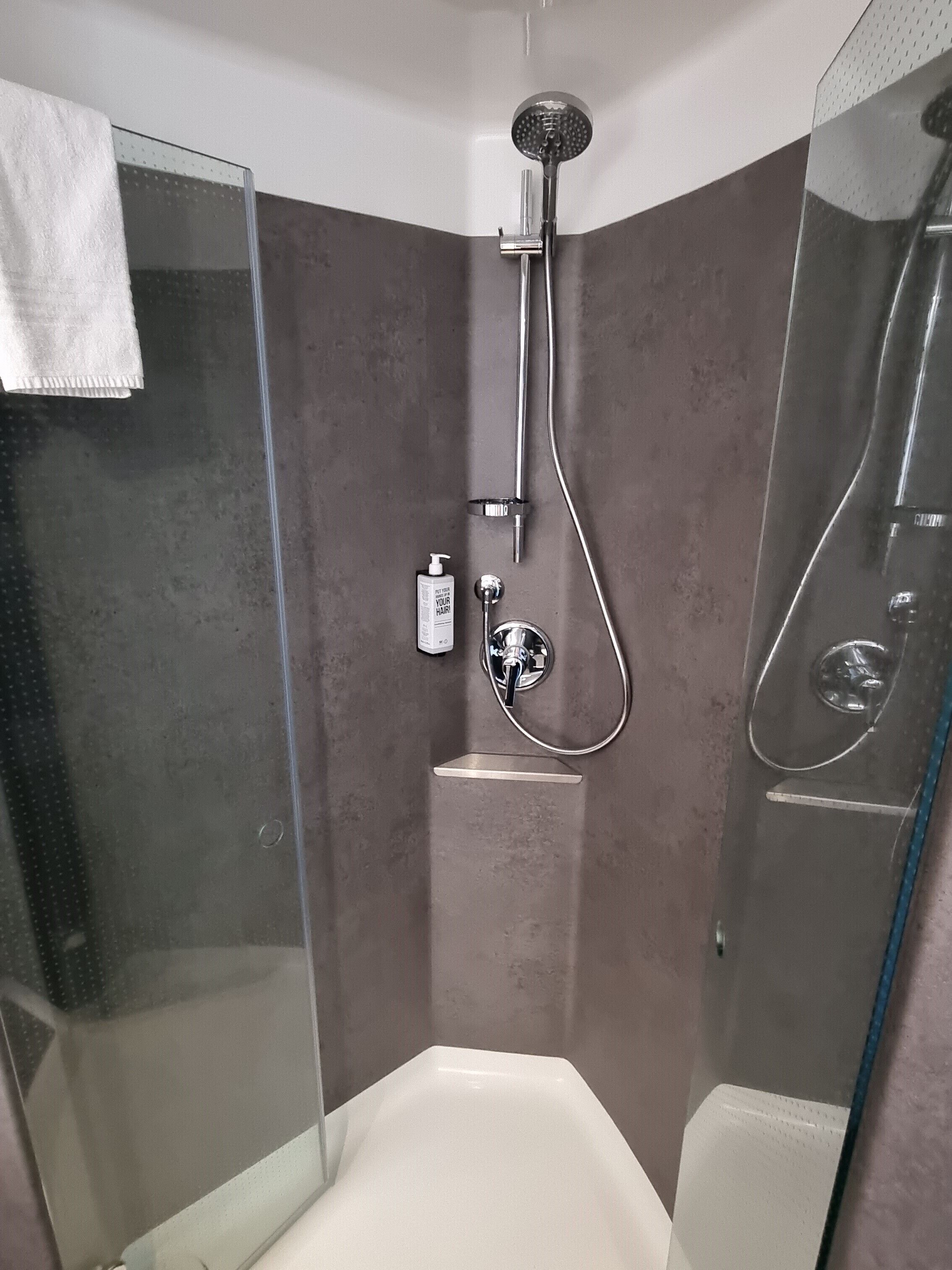 shower, eco-friendly toiletries, hair dryer, towels