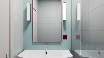 Un baño con un lavamanos blanco, un espejo de marco rojo y un perchero para toallas.