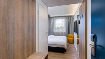 Hypo-allergenic bedding, desk, blackout drapes, soundproofing