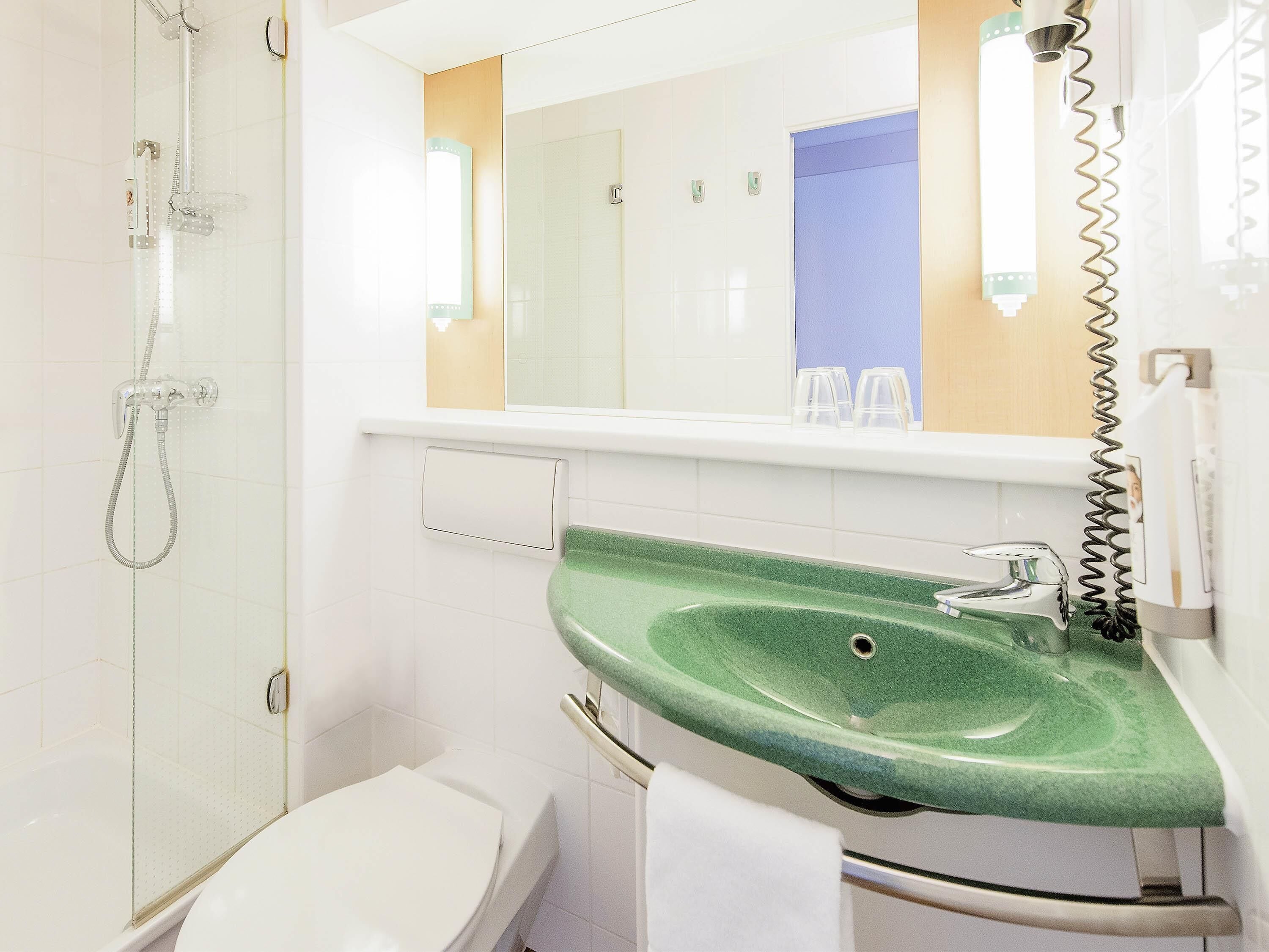 Hypo-allergenic bedding, desk, blackout drapes, soundproofing