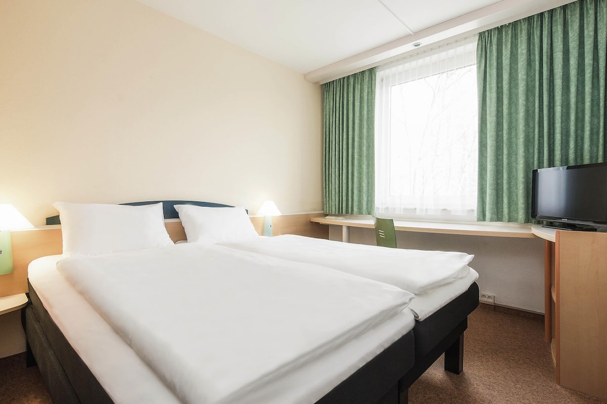 Hypo-allergenic bedding, desk, blackout curtains, soundproofing