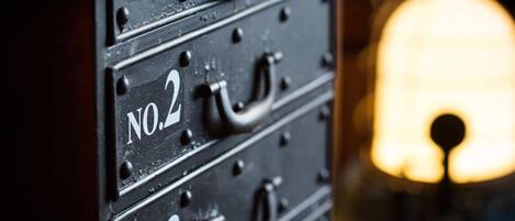 A close-up of a metal filing cabinet with drawers labeled NO.1, NO.2, and NO.3.