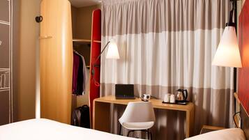 In-room safe, desk, WiFi (free), alarm clocks