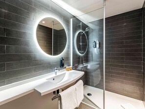 Shower, eco-friendly toiletries, hair dryer, towels