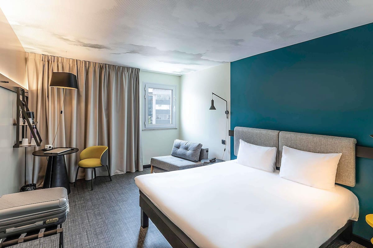 Desk, laptop workspace, blackout drapes, soundproofing