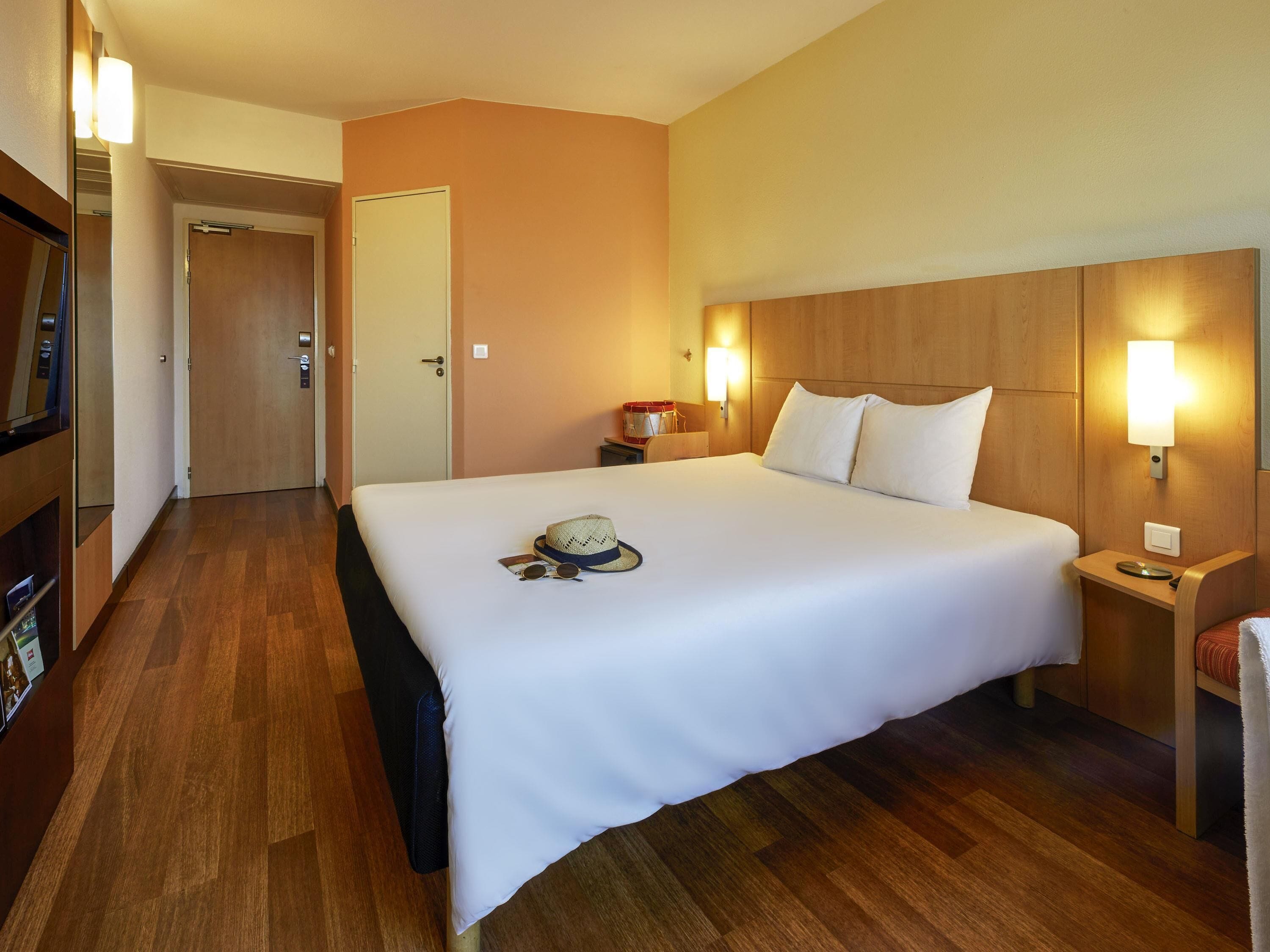 Ropa de cama de alta calidad y artículos del minibar gratis 