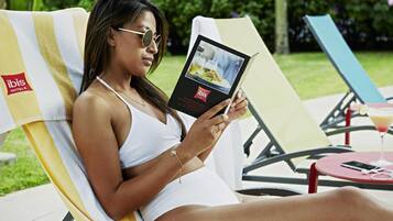 Outdoor pool, open 6:00 AM to 7:00 PM, pool umbrellas, pool loungers