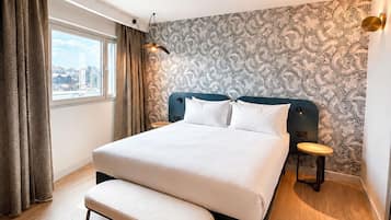 Junior suite, 1 tweepersoonsbed | Luxe beddengoed, een minibar met enkele gratis items
