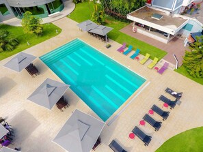 Outdoor pool, open 6:00 AM to 7:00 PM, pool umbrellas, pool loungers