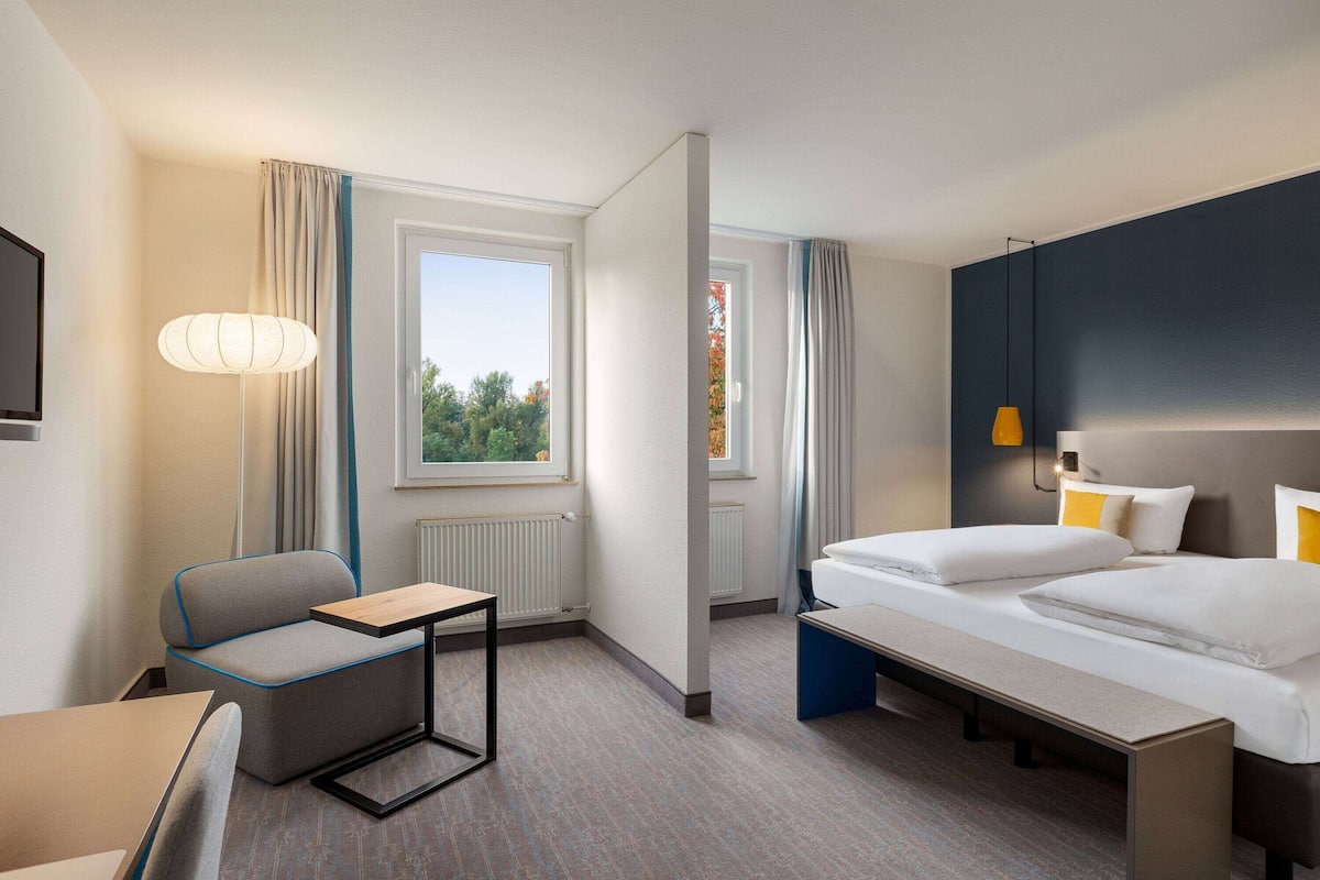 hypo-allergenic bedding, desk, iron/ironing board, free cots/infant beds