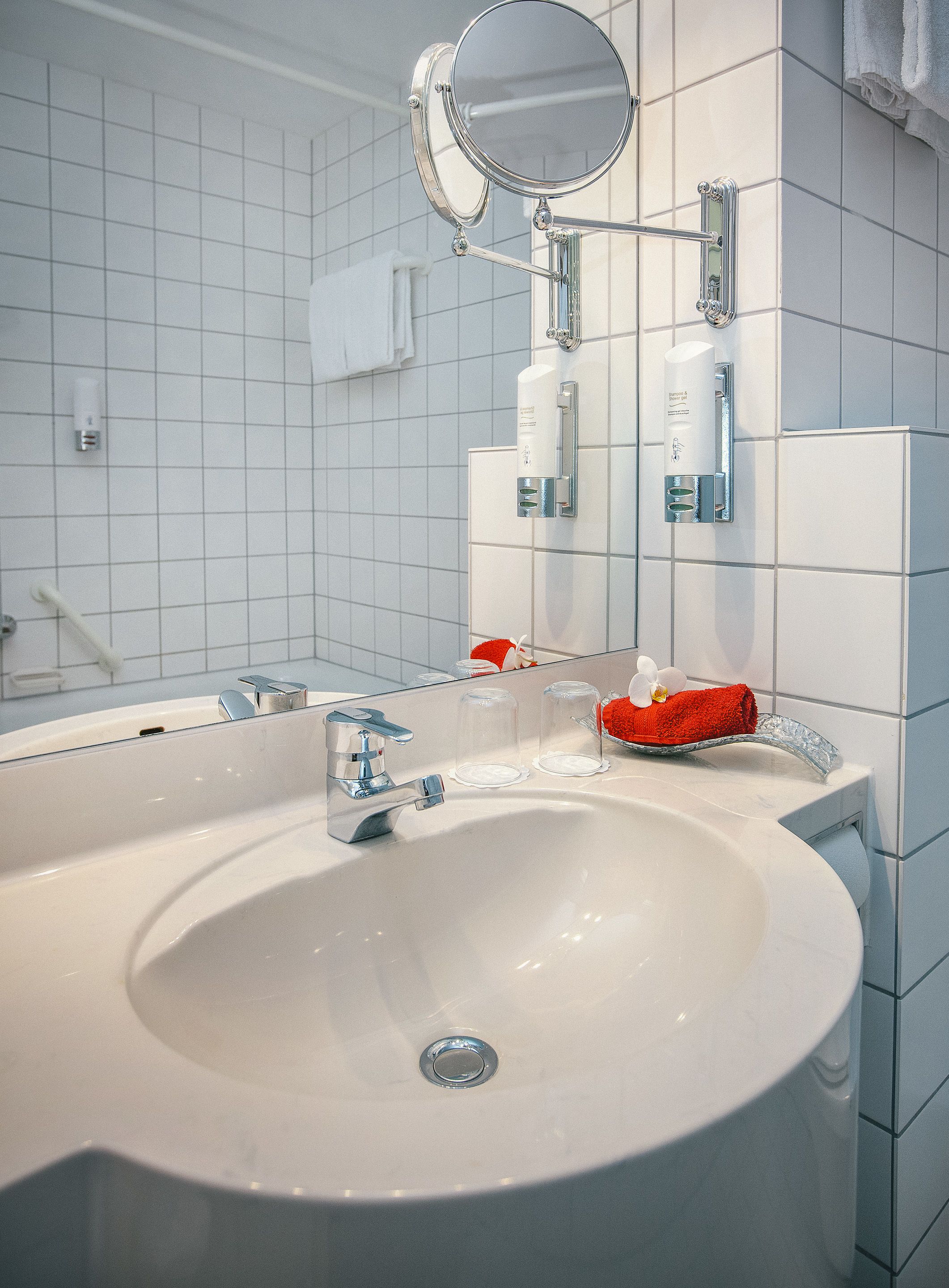 bathtub, hair dryer, towels