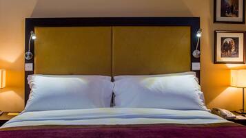 Edredons de pluma, frigobar, cofres nos quartos, escrivaninha