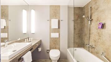 Combined shower/tub, hair dryer, towels, soap