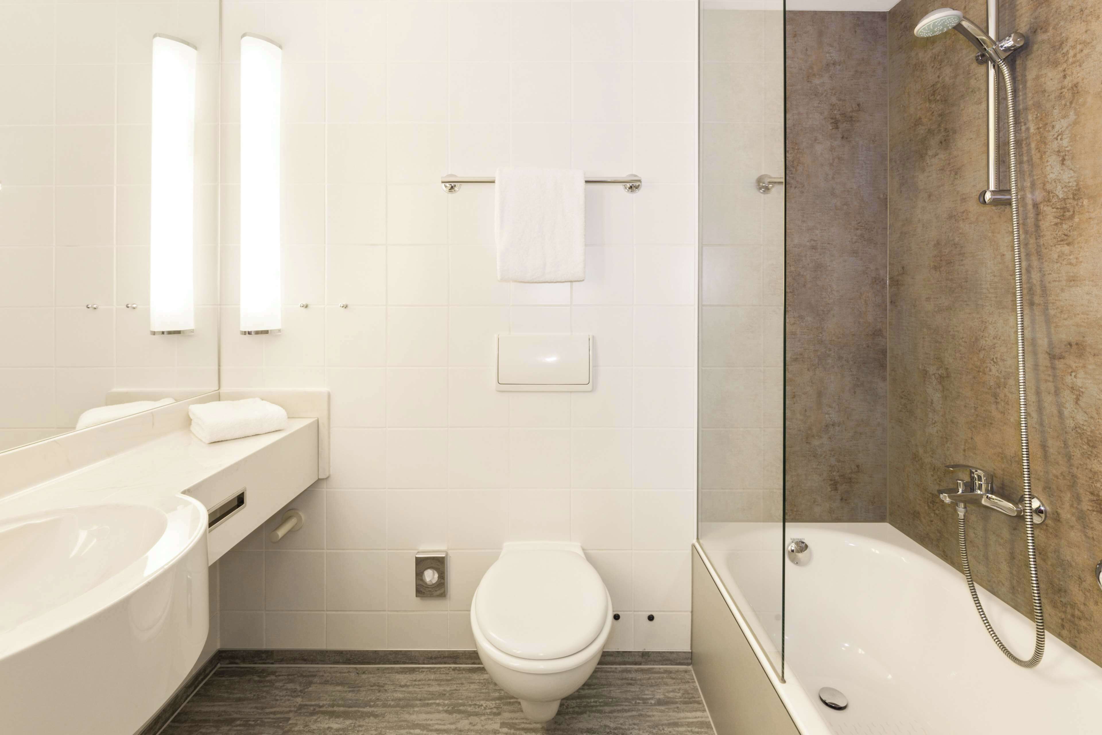 combined shower/bathtub, hair dryer, towels, soap