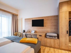 Hypo-allergenic bedding, pillow-top beds, in-room safe, desk