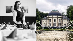 A waiter in a restaurant setting with tables set for dining. - Mercure Hotel Bad Oeynhausen City (Bad Oeynhausen)