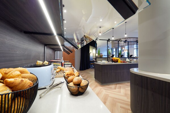 Daily buffet breakfast (EUR 13 per person)