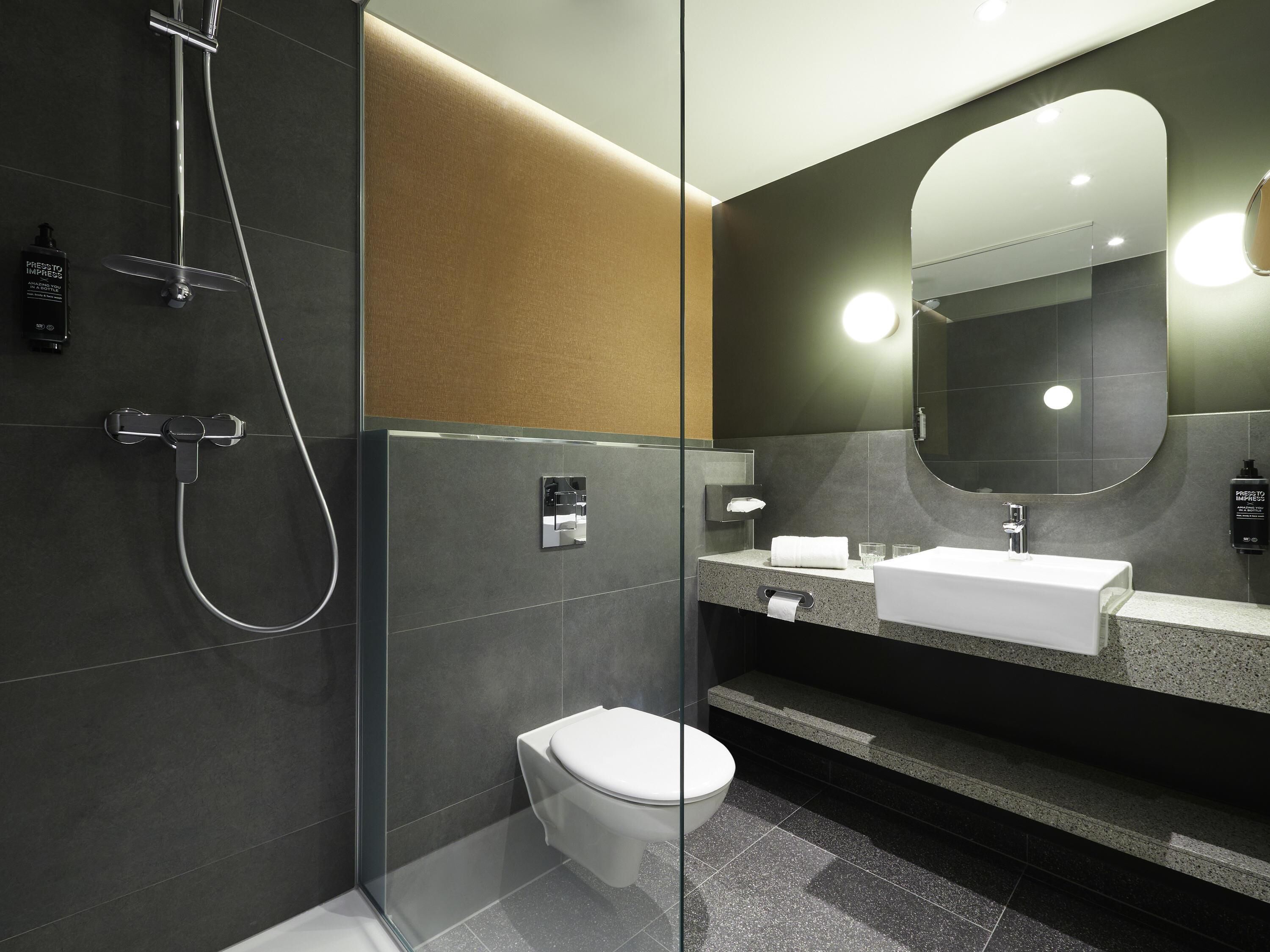 Shower, eco-friendly toiletries, hair dryer, towels