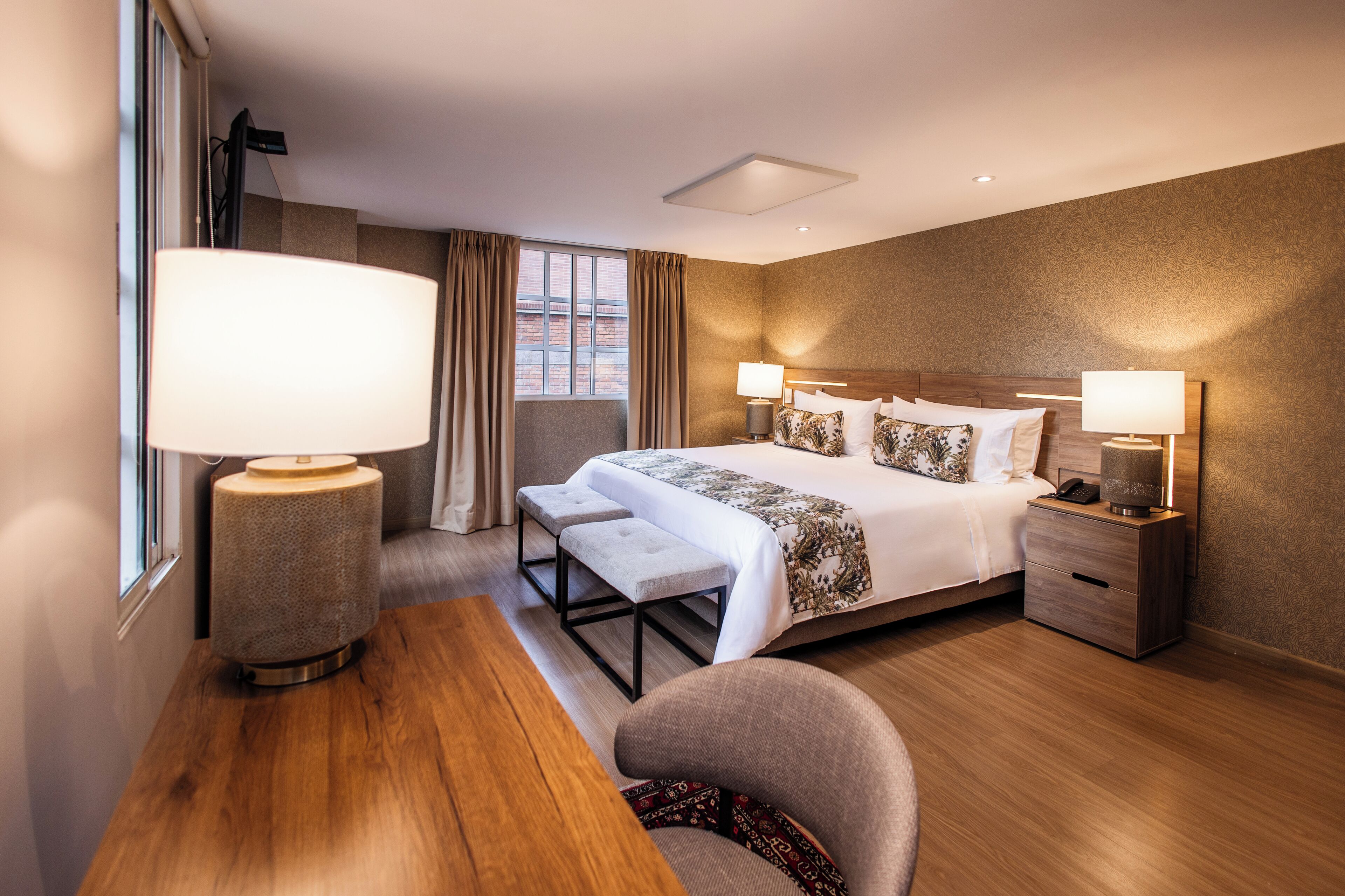 junior studio suite, 1 king bed | premium bedding, minibar, in-room safe, desk
