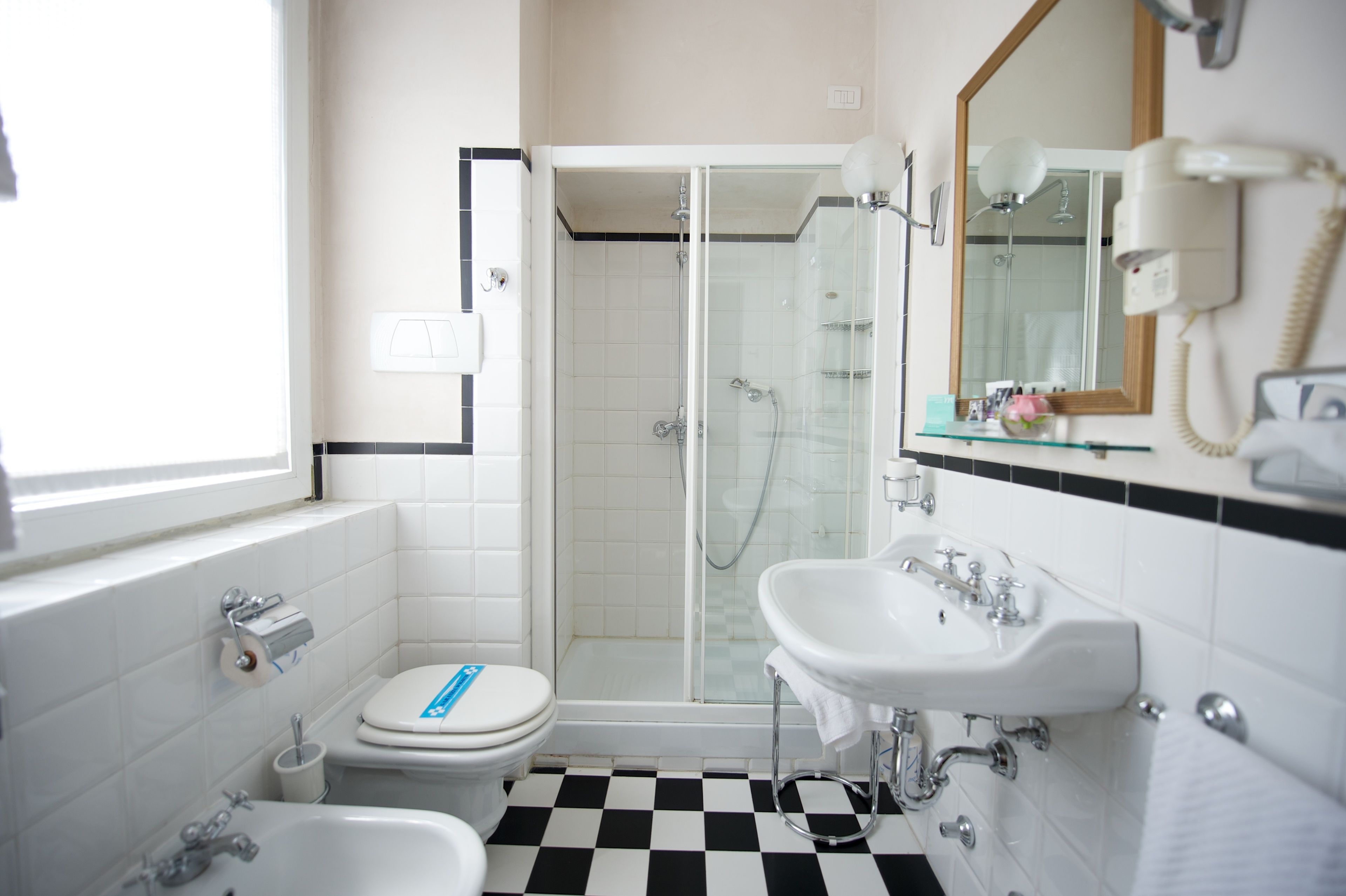 superior room, 1 queen bed, non smoking, view (square view) | bathroom | eco-friendly toiletries, hair dryer, bidet, towels