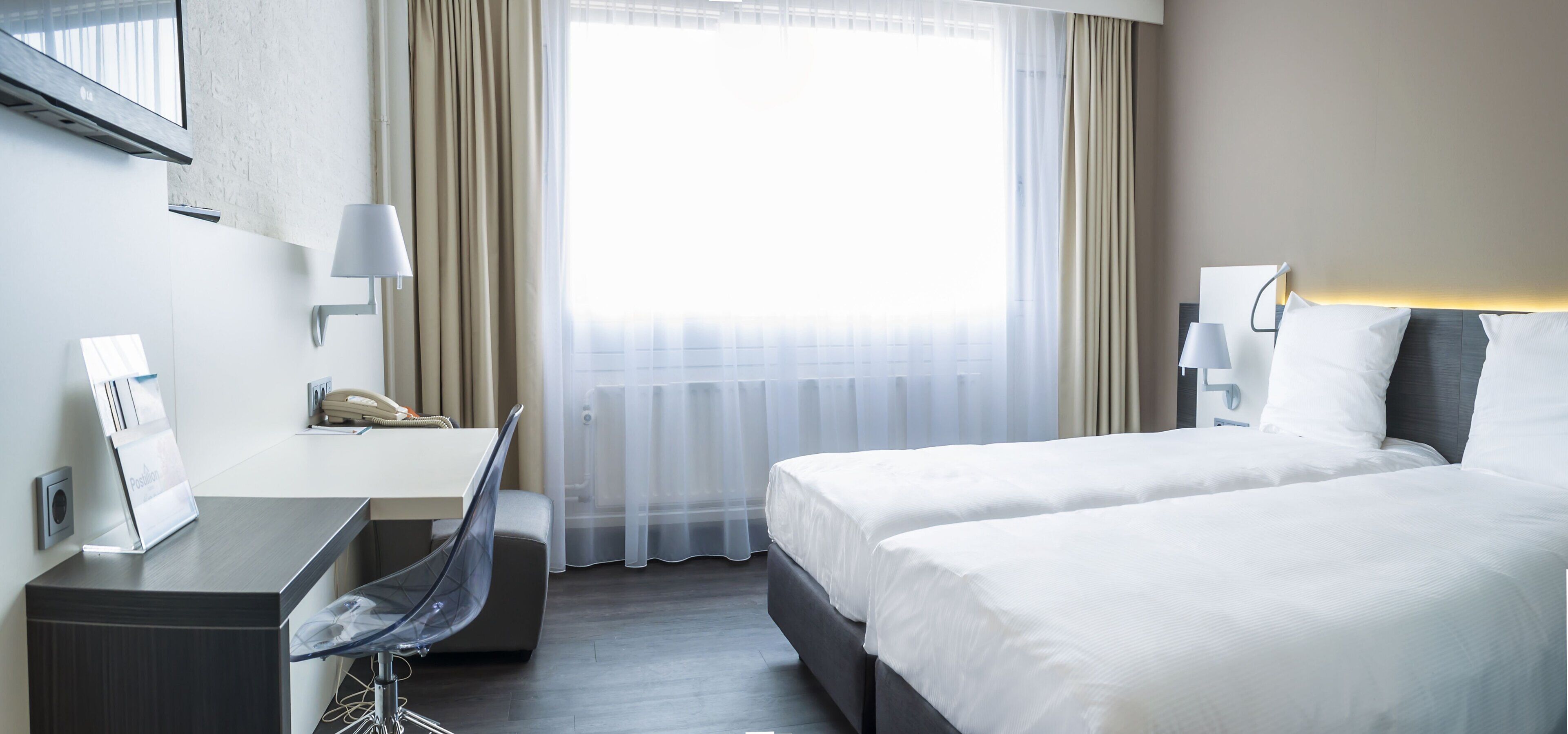 desk, blackout curtains, free wifi, bed sheets