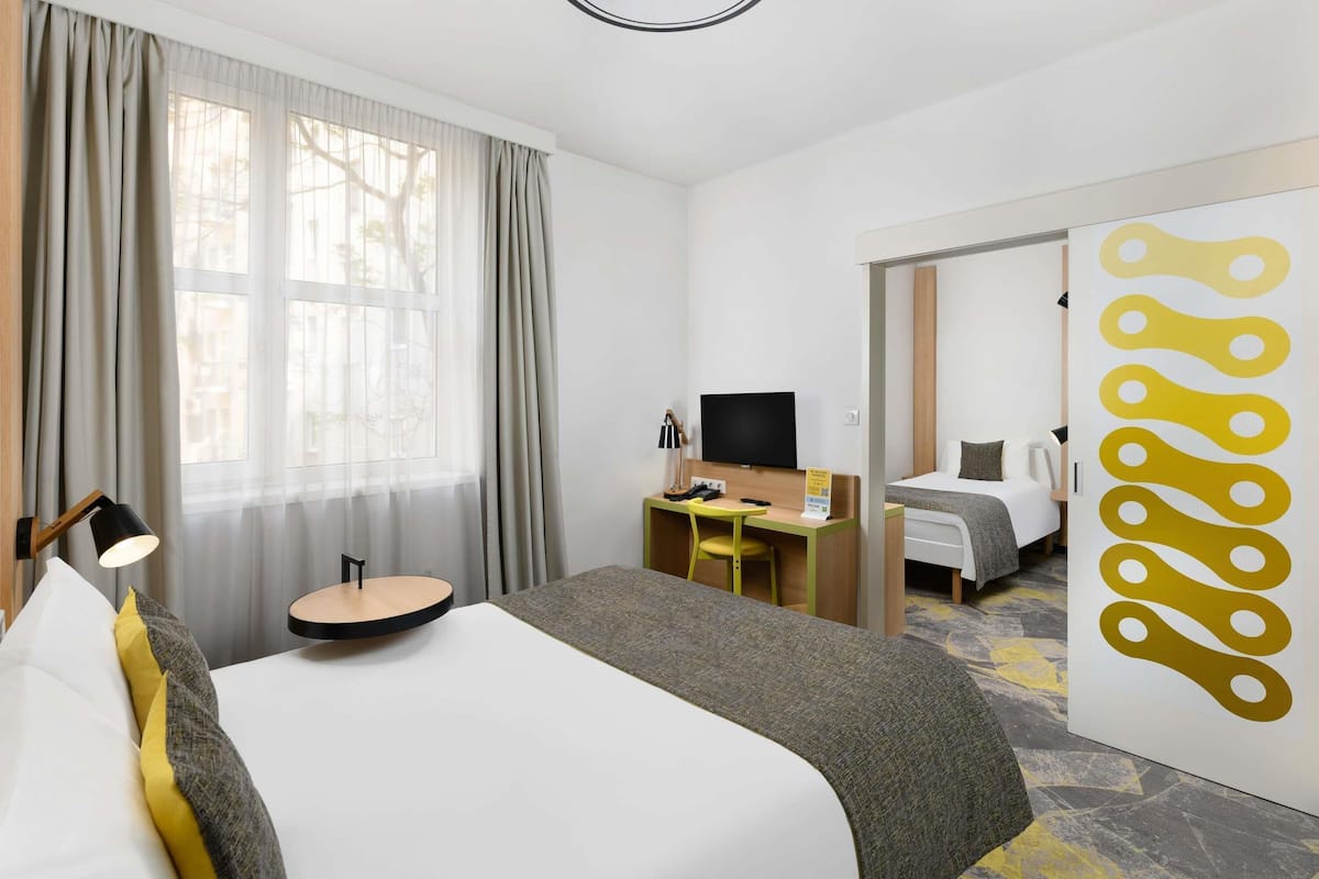 Family Room, 2 Double Beds | In-room safe, desk, laptop workspace, blackout curtains