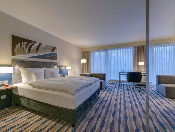 Hypo-allergenic bedding, in-room safe, desk, laptop workspace