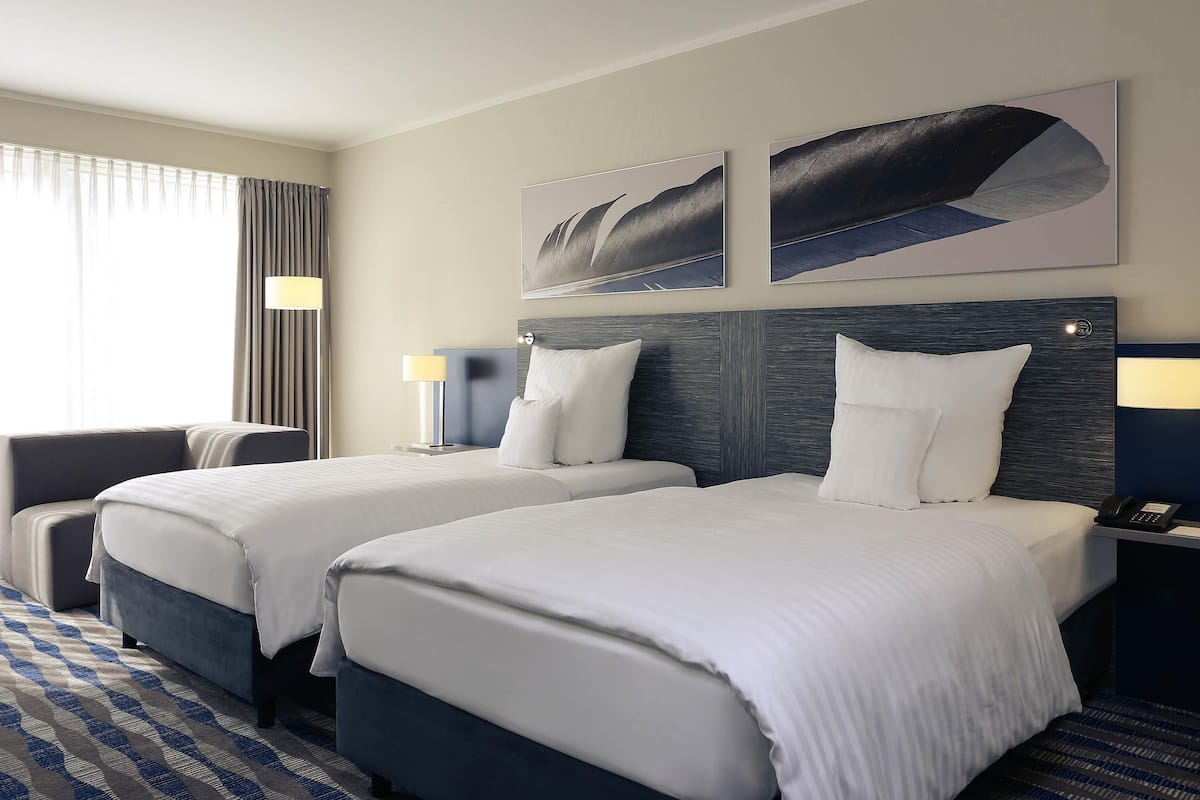 Hypo-allergenic bedding, in-room safe, desk, laptop workspace