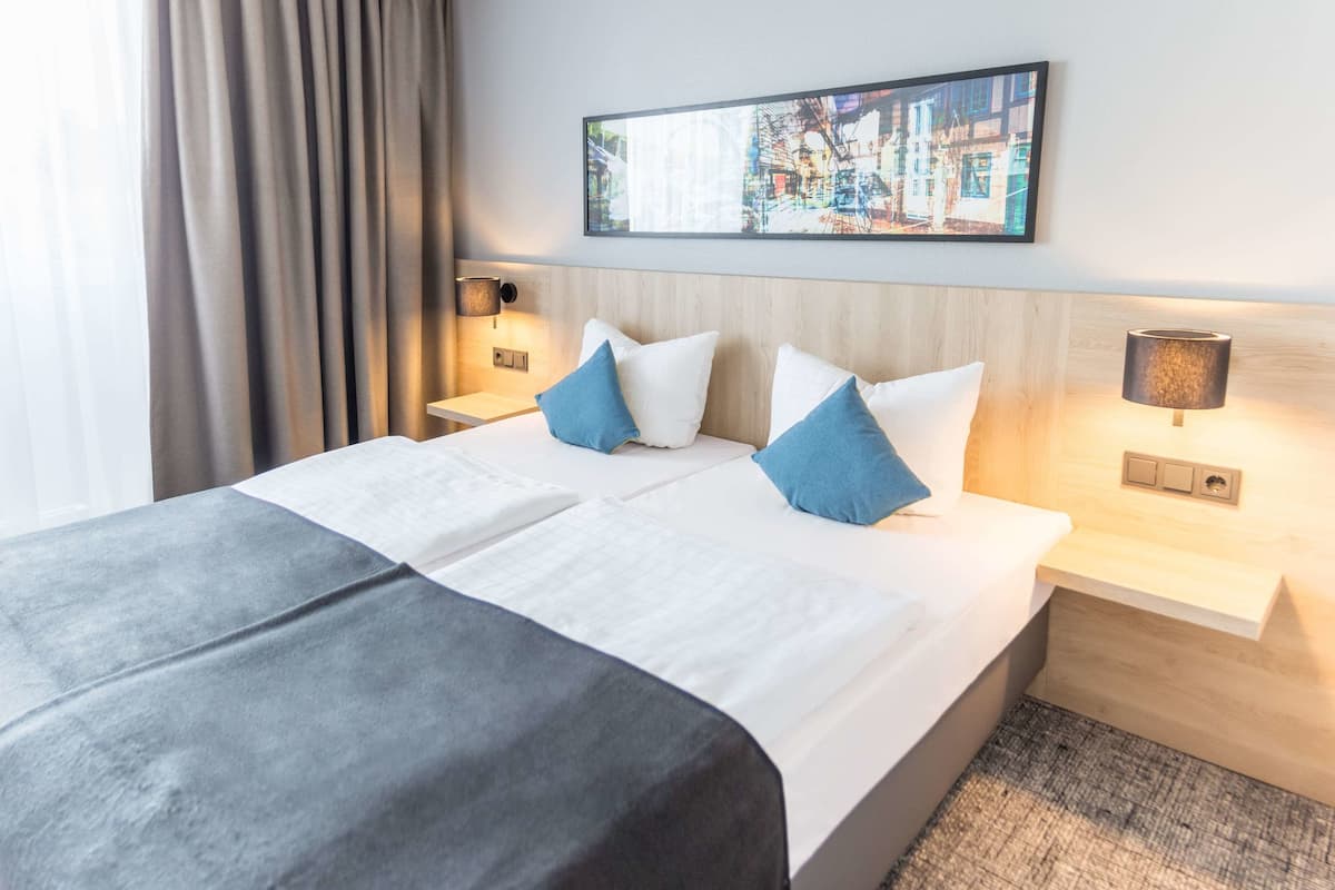 Hypo-allergenic bedding, desk, laptop workspace, free WiFi