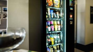 A vending machine with snacks and beverages.