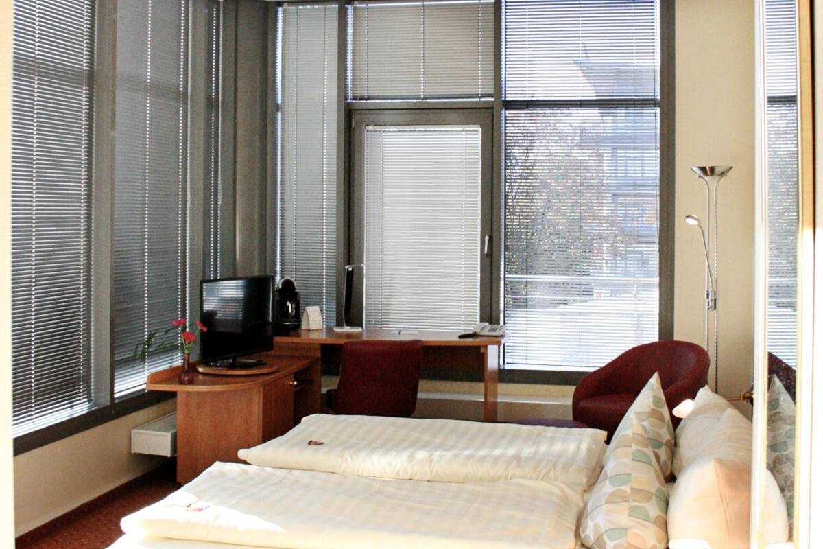 in-room safe, desk, blackout curtains, iron/ironing board