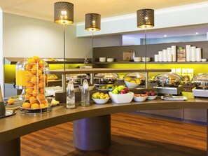 A buffet setup with various food items and beverages. - ibis Styles Louvain la Neuve Hotel et Events (Ottignies-Louvain-la-Neuve)