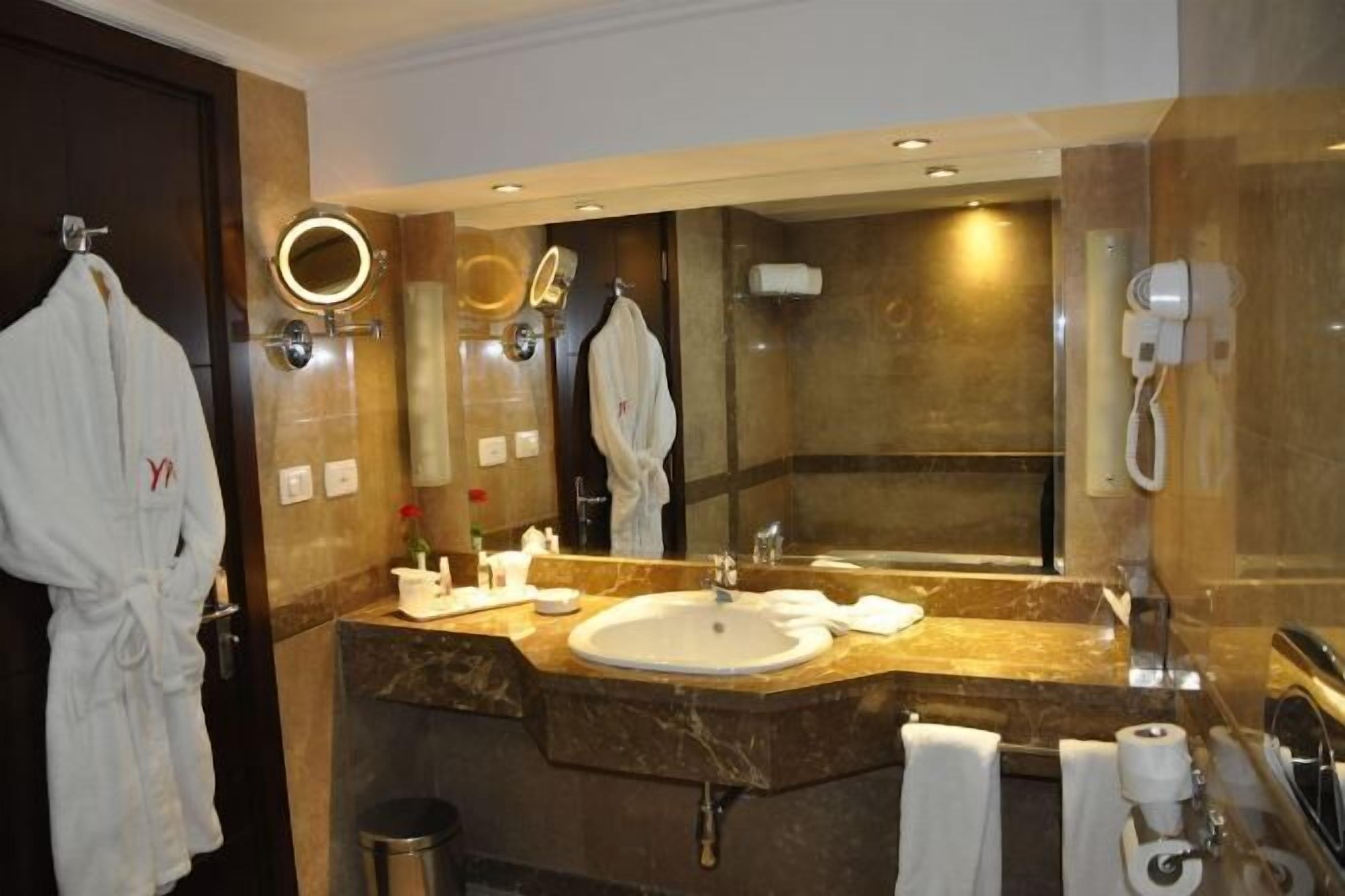 Bathroom | Combined shower/tub, spring water tub, designer toiletries, hair dryer