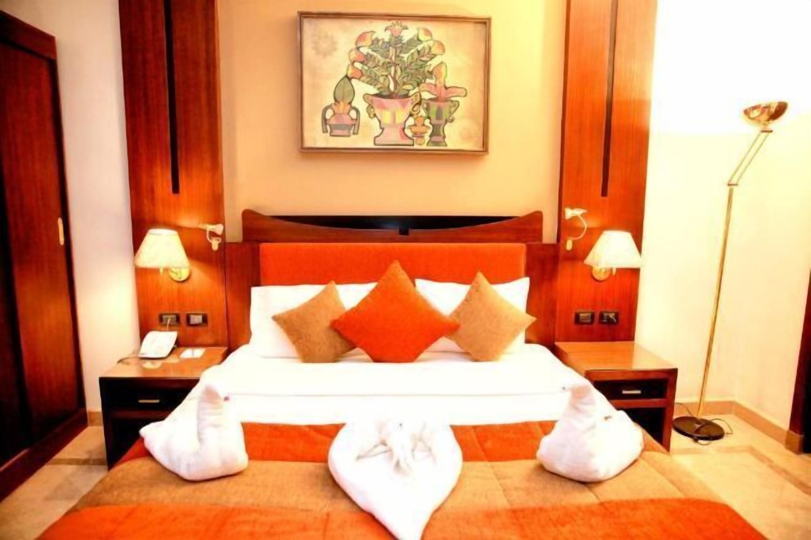 Hypo-allergenic bedding, minibar, in-room safe, individually decorated