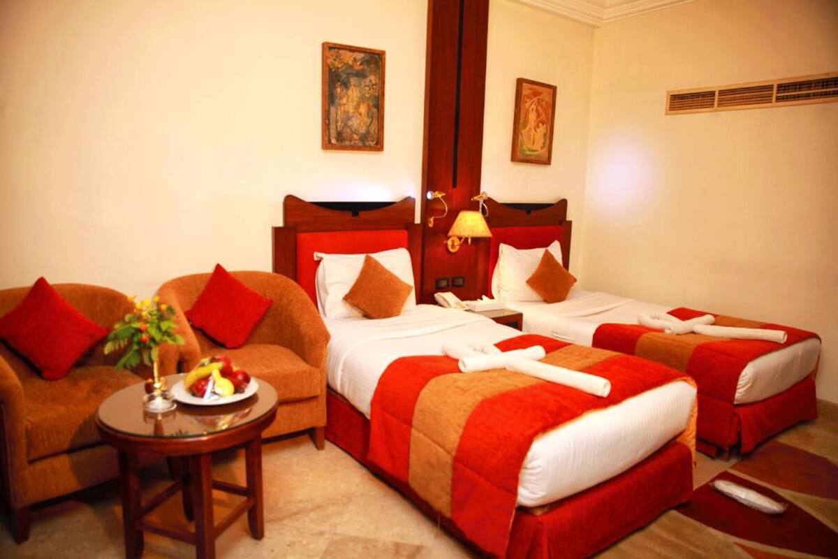 Hypo-allergenic bedding, minibar, in-room safe, blackout curtains