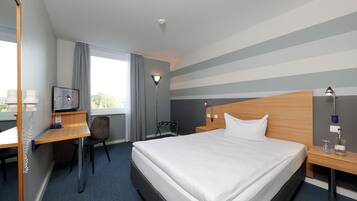 Habitación empresarial, 1 cama King size | Escritorio, cortinas blackout y insonorización