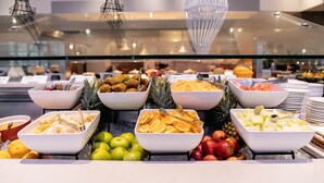 A buffet with various fruits and vegetables. - Sofitel Gold Coast Broadbeach (Broadbeach)