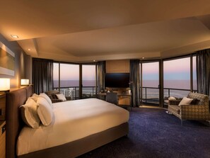 Habitación de lujo, 1 cama King size, hidromasaje, vista al océano | Ropa de cama de alta calidad y minibar 