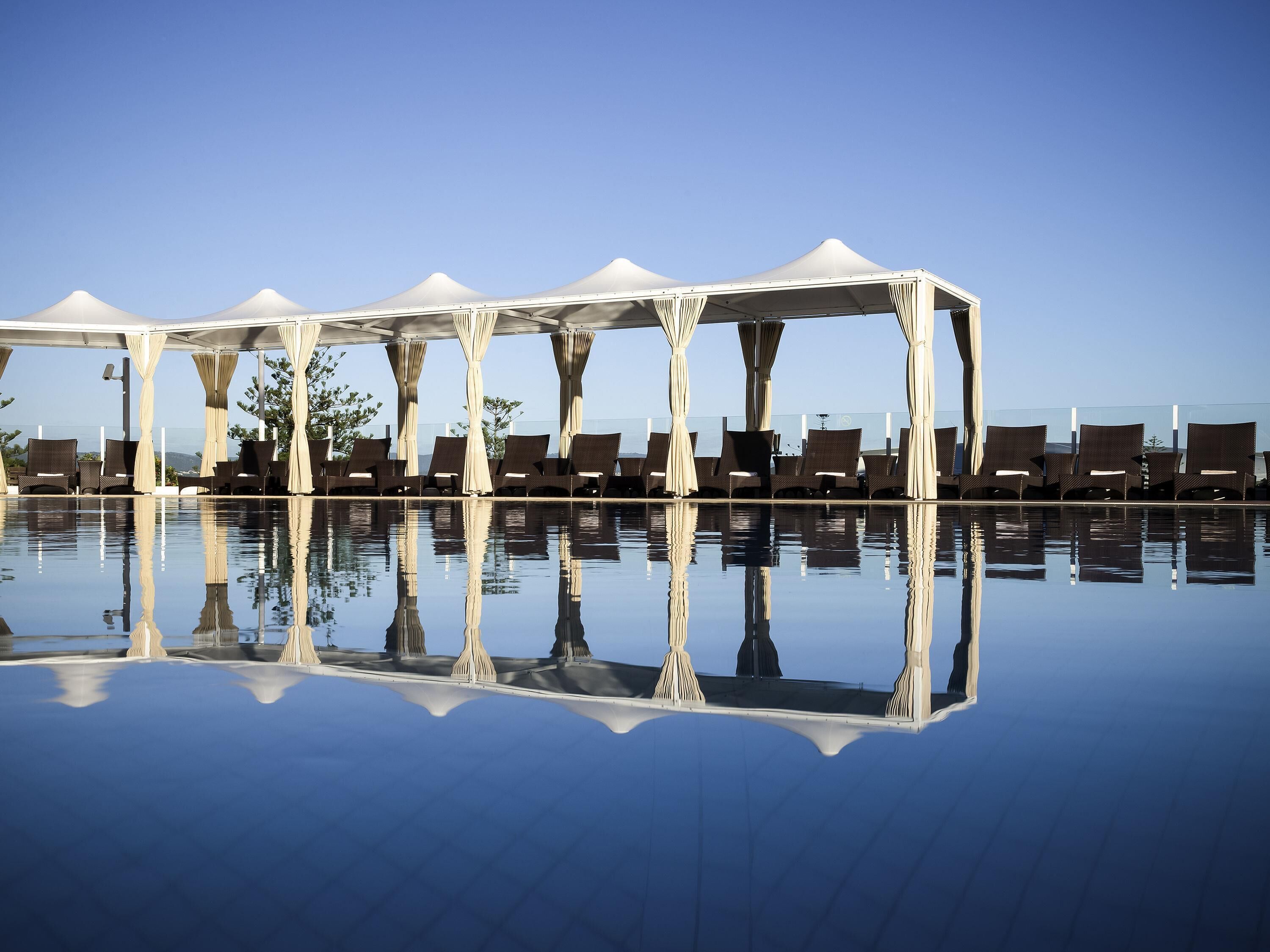 2 outdoor pools, open 6:00 AM to 6:00 PM, free pool cabanas