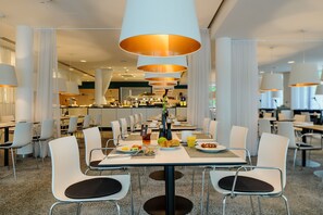 Breakfast, lunch served; international cuisine, al fresco dining 