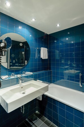 Eco-friendly toiletries, hair dryer, towels