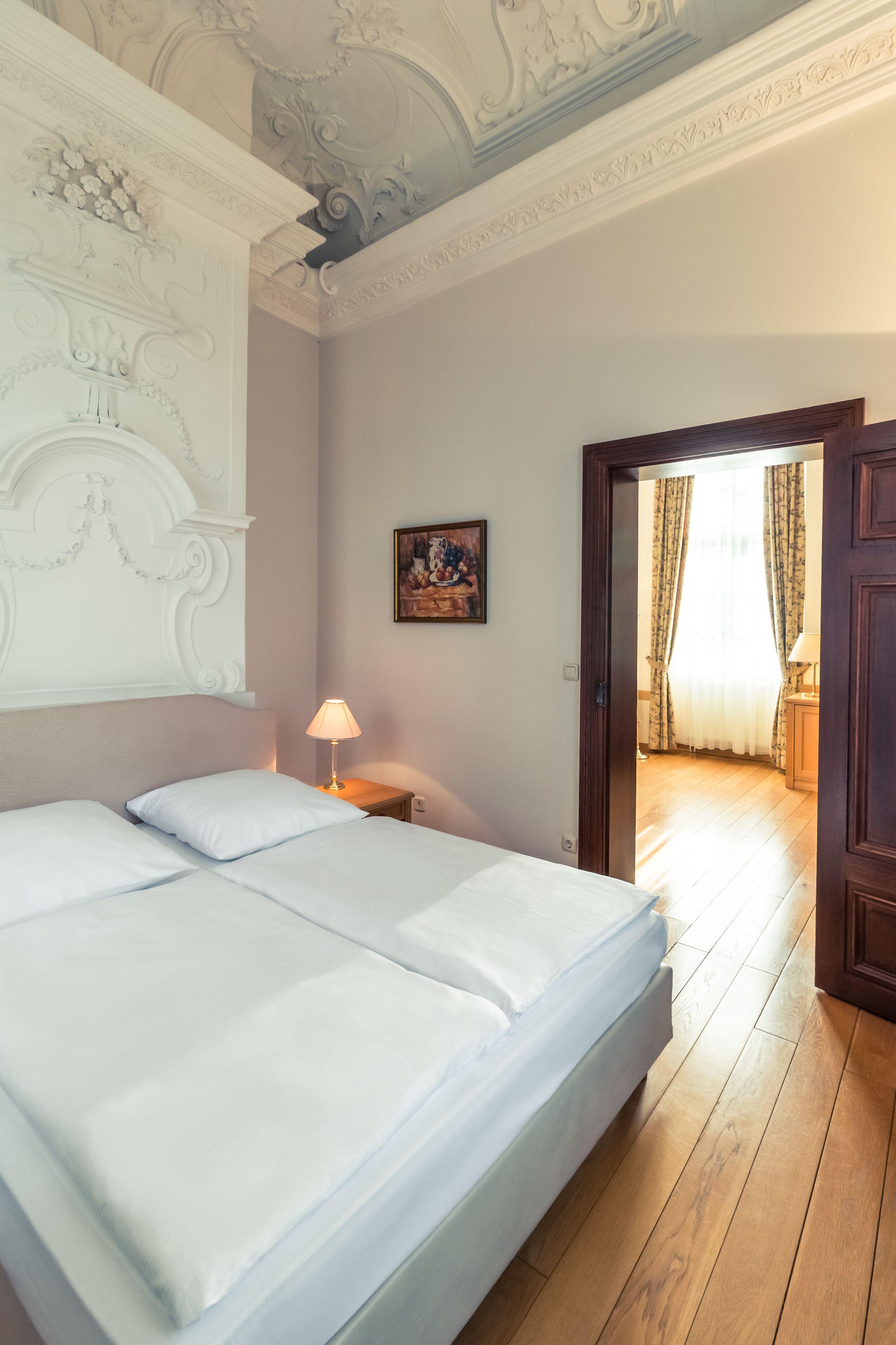 deluxe suite | hypo-allergenic bedding, desk, blackout curtains, soundproofing