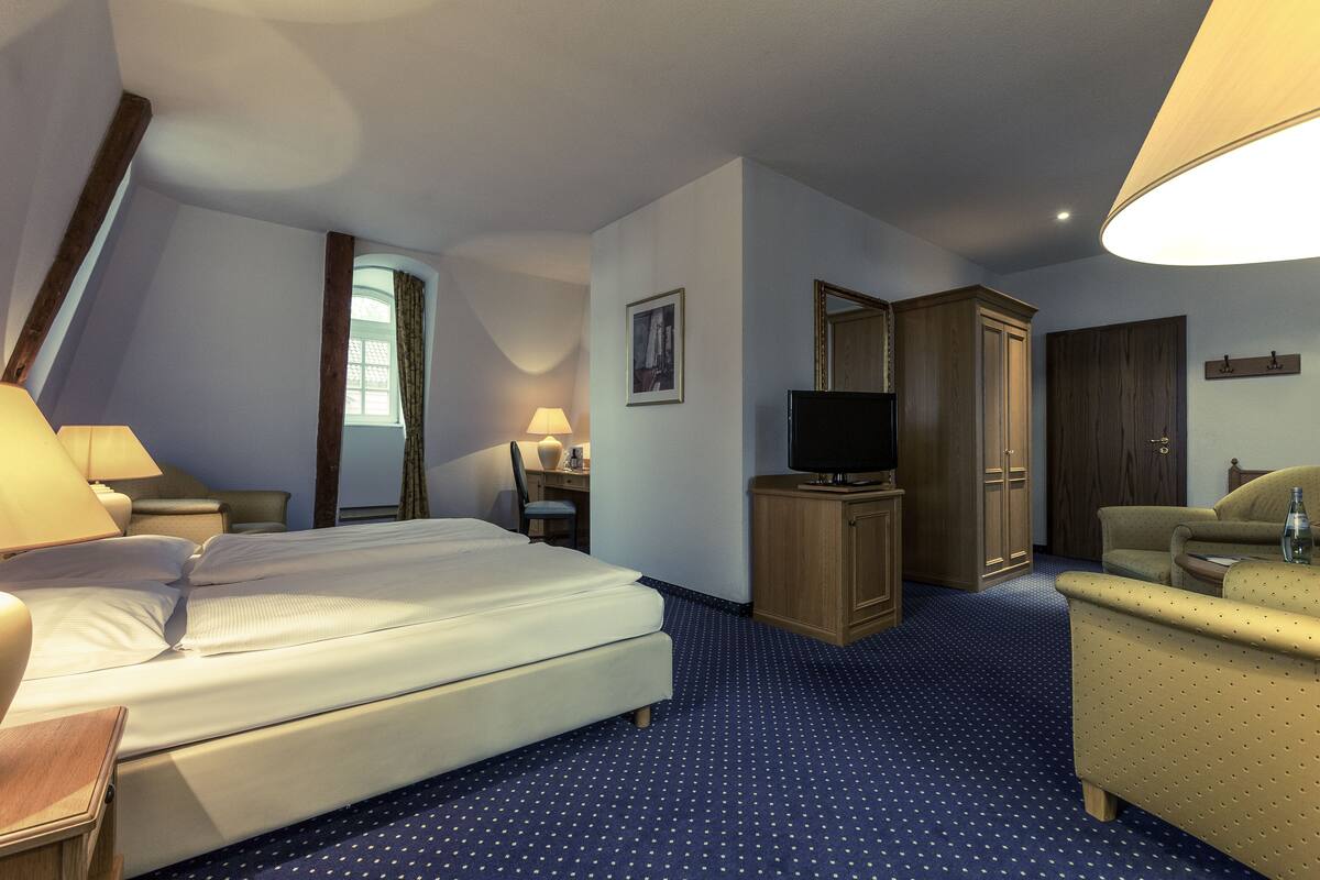 hypo-allergenic bedding, desk, blackout curtains, soundproofing