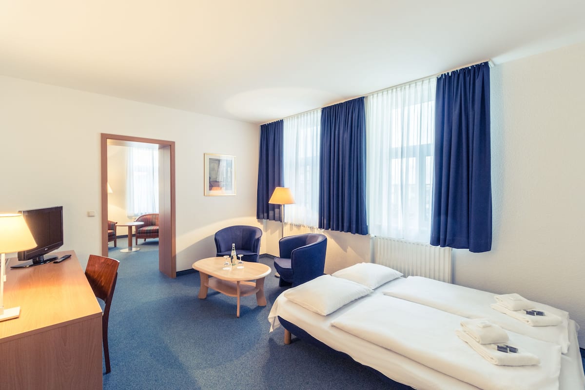 family room, annex building | hypo-allergenic bedding, desk, blackout curtains, soundproofing