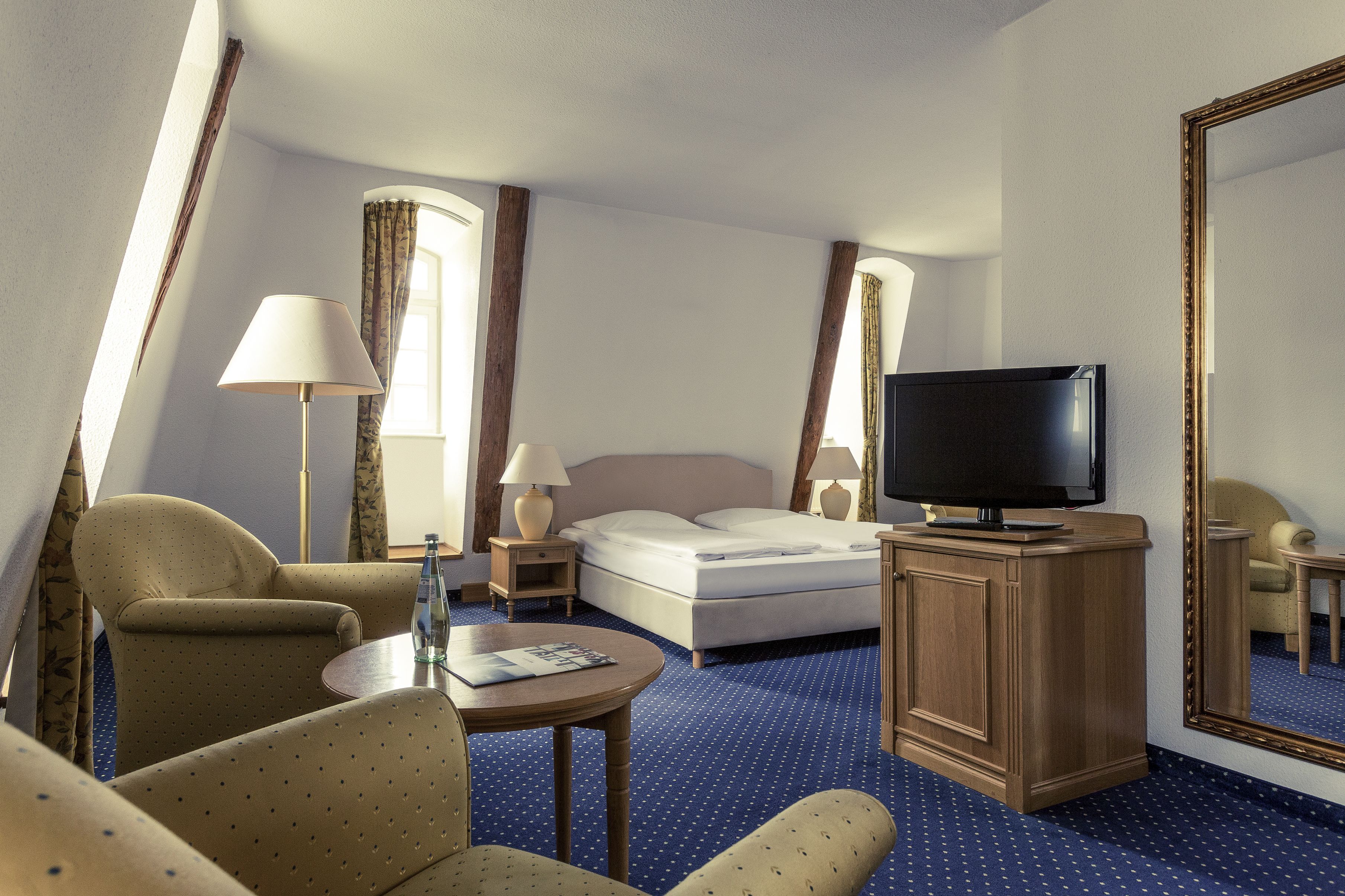 hypo-allergenic bedding, desk, blackout curtains, soundproofing