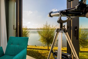 Comfort Room, 1 Queen Bed, Lake View | Beach/ocean view