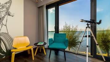 Comfort Room, 1 Queen Bed, Lake View | 1 bedroom, in-room safe, desk, laptop workspace